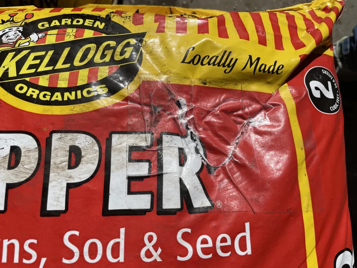 The same bag of garden soil repaired and back on the pallet